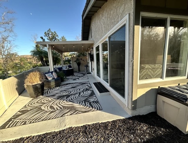 view of patio / terrace with a balcony