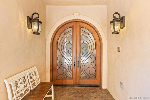 doorway to property featuring french doors