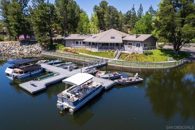 dock area featuring a water view