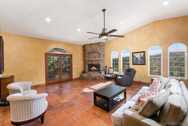 living room featuring a fireplace, high vaulted ceiling, french doors, and ceiling fan