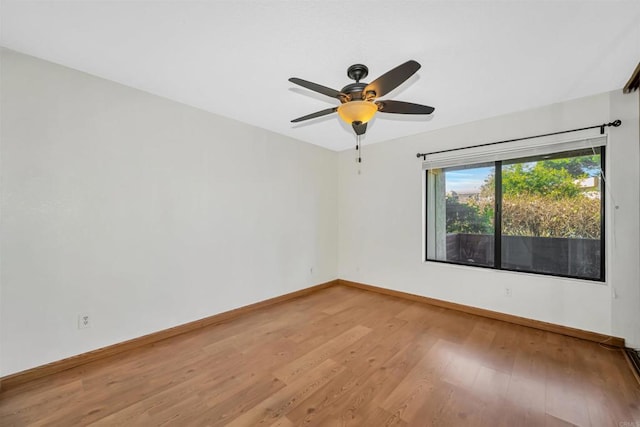 unfurnished room featuring wood-type flooring and ceiling fan