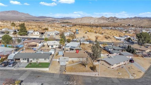 drone / aerial view featuring a mountain view