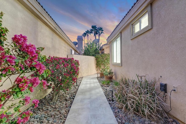 view of property exterior at dusk