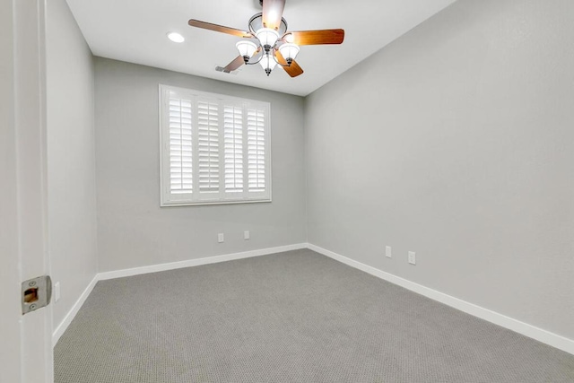 carpeted empty room with ceiling fan