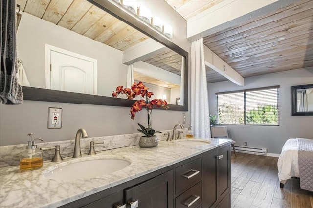 bathroom featuring vaulted ceiling with beams, wooden ceiling, a baseboard radiator, vanity, and hardwood / wood-style flooring