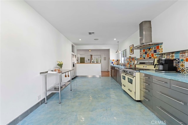 kitchen featuring white stove, decorative light fixtures, gray cabinets, and exhaust hood