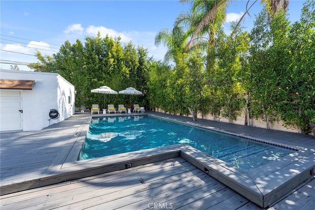 view of pool with a deck