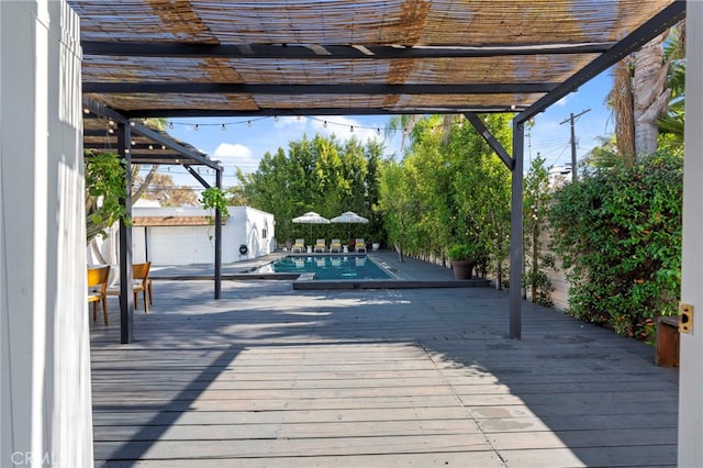 wooden deck featuring a pergola