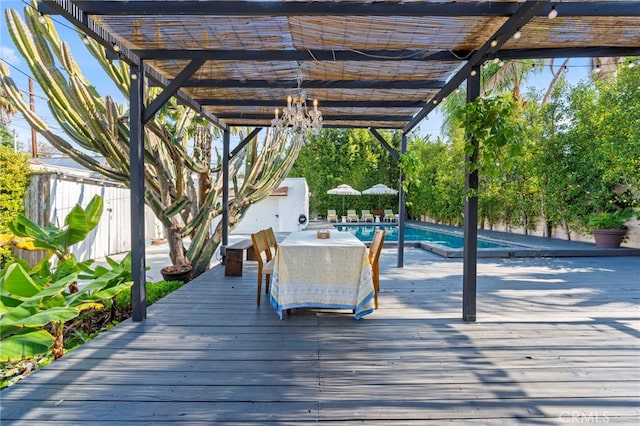 wooden terrace with a pergola