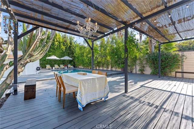 wooden deck featuring a pergola