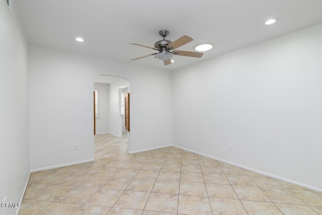 unfurnished room with ceiling fan