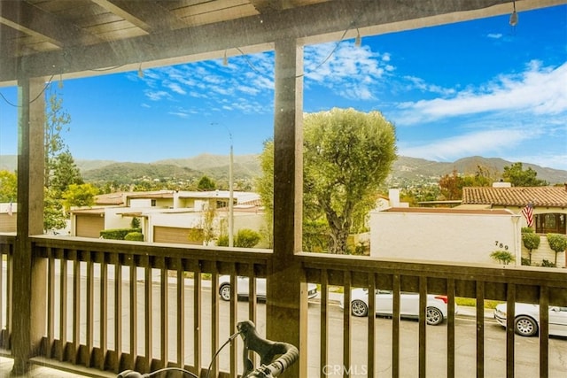 balcony featuring a mountain view