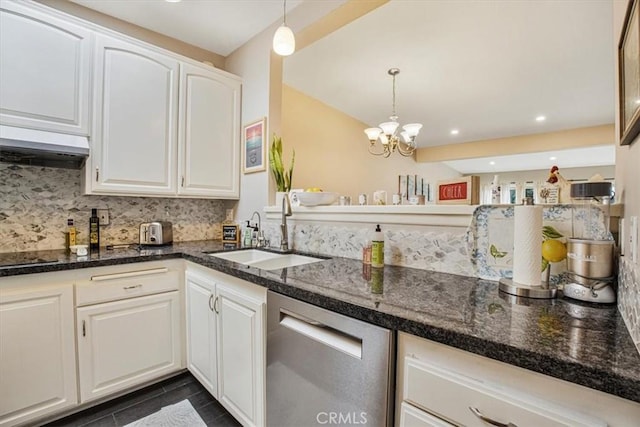 kitchen featuring decorative light fixtures, dishwasher, dark stone countertops, sink, and white cabinetry