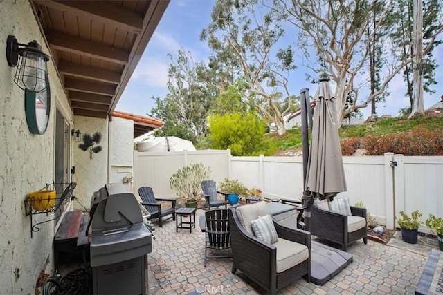 view of patio / terrace featuring a grill