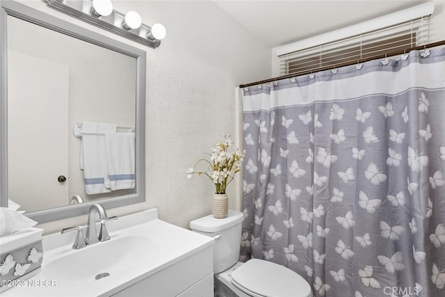 710 Crystal Way, Nipomo, CA 93444 - bathroom featuring a textured wall, vanity, and a shower with curtain