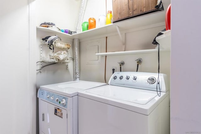 laundry room with washer and dryer