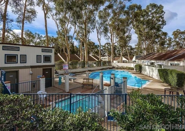 view of pool featuring a patio