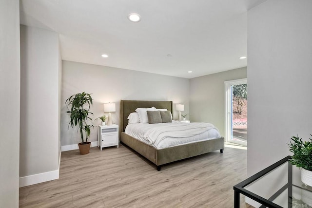 bedroom with light hardwood / wood-style flooring