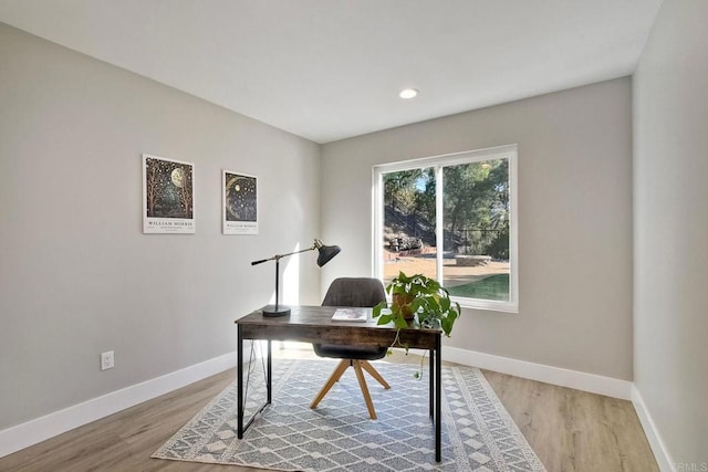 office space featuring light wood-type flooring