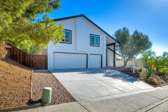 view of front of home with a garage