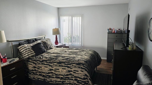 bedroom featuring hardwood / wood-style floors