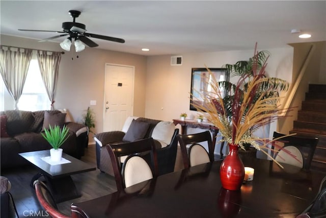 dining room featuring ceiling fan and hardwood / wood-style floors