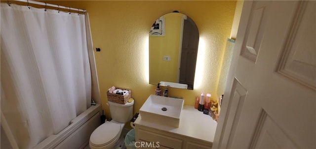 full bathroom with shower / tub combo, vanity, and toilet