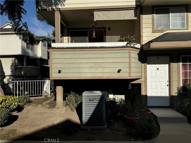 view of property exterior with cooling unit