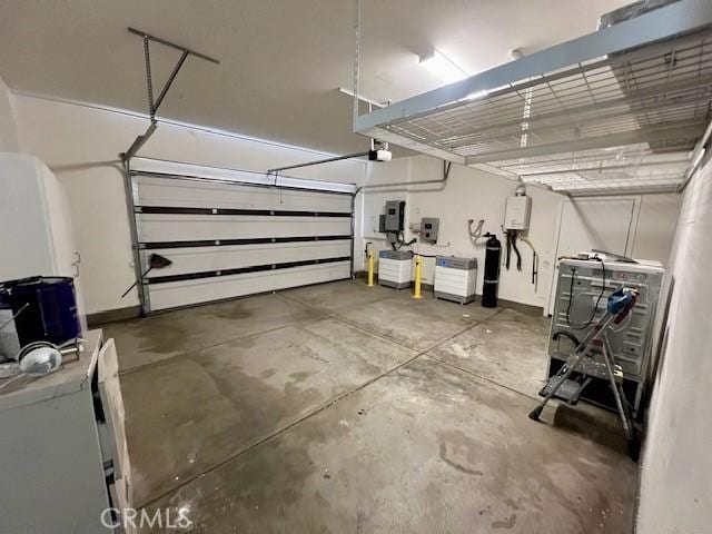 garage with electric panel and a garage door opener