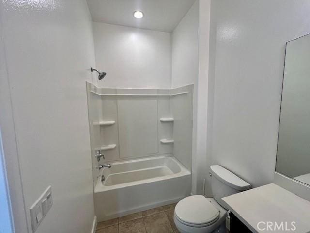 full bathroom featuring toilet, shower / bathtub combination, tile patterned floors, and vanity