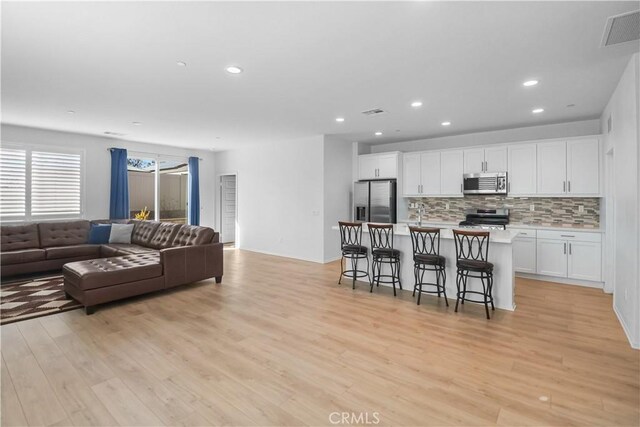 living room featuring light hardwood / wood-style floors