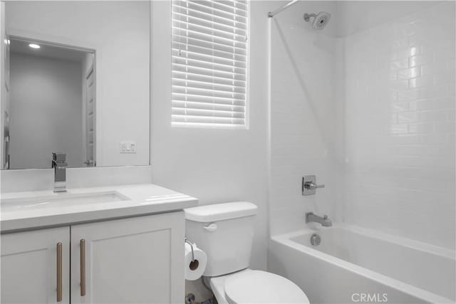 full bathroom featuring shower / tub combination, toilet, and vanity