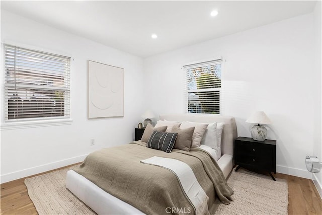 bedroom featuring light wood-type flooring