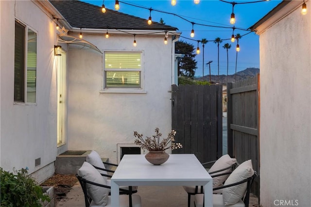 view of patio / terrace featuring a mountain view