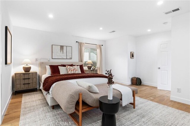 bedroom featuring light hardwood / wood-style floors