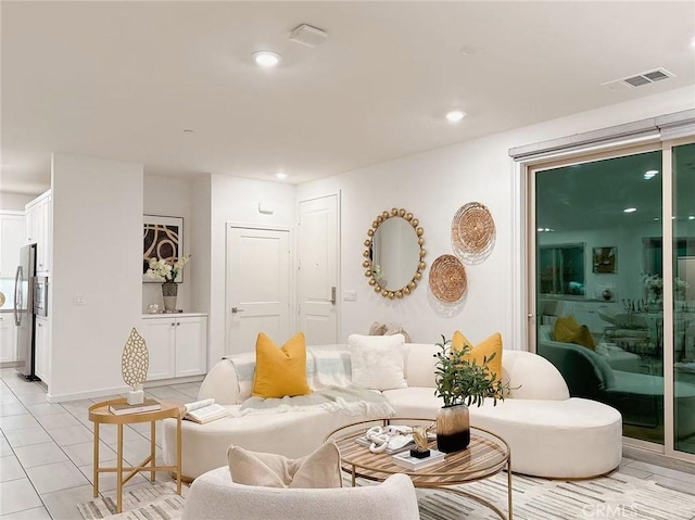 living room with light tile patterned flooring