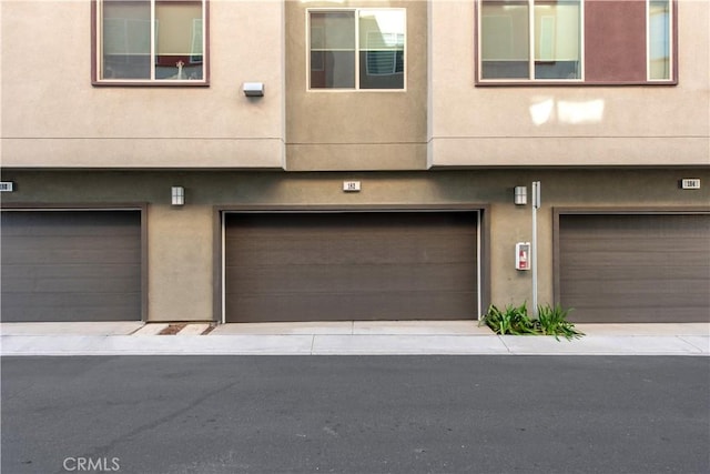 exterior space with a garage