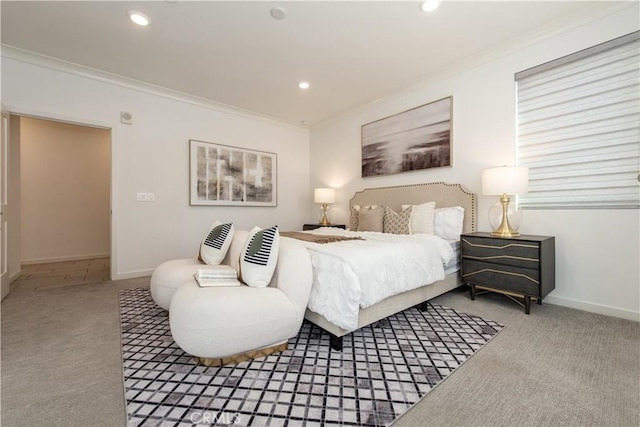 carpeted bedroom featuring crown molding