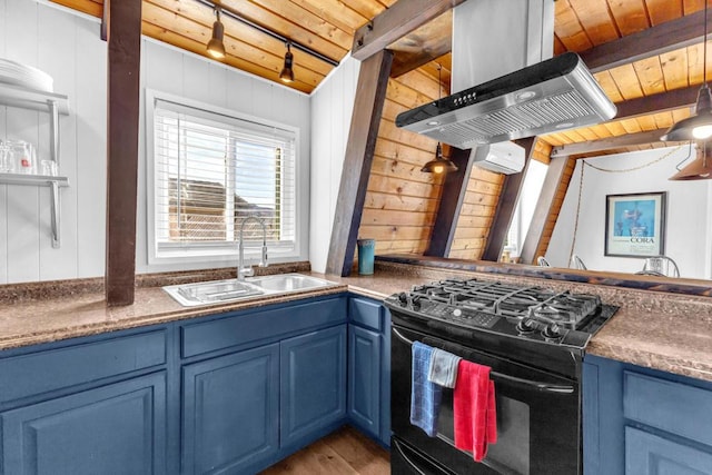 kitchen with blue cabinets, black gas range oven, sink, and wood ceiling