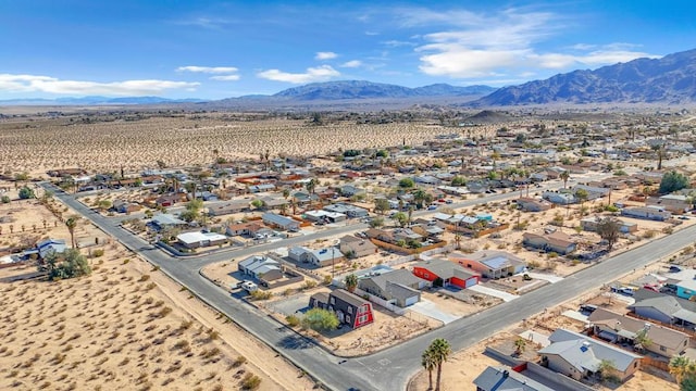 drone / aerial view featuring a mountain view