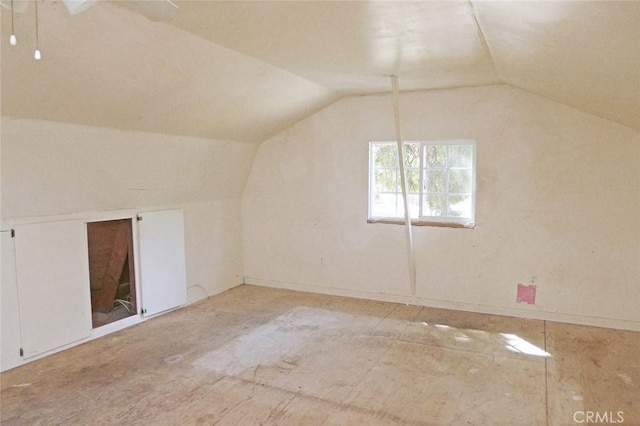 bonus room featuring lofted ceiling