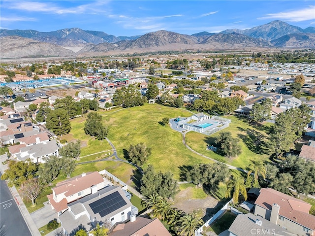 birds eye view of property featuring a mountain view