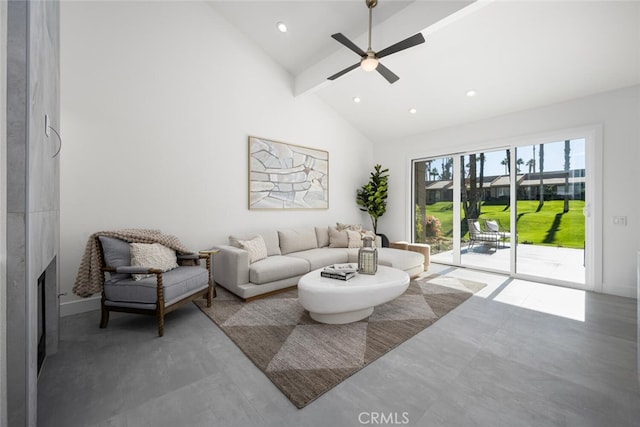 living room with ceiling fan, a fireplace, and high vaulted ceiling