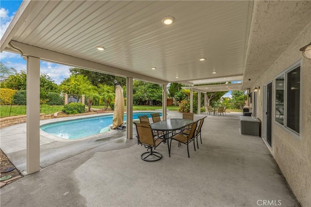 view of pool featuring a patio