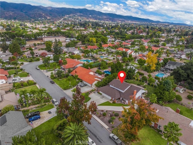 bird's eye view with a mountain view