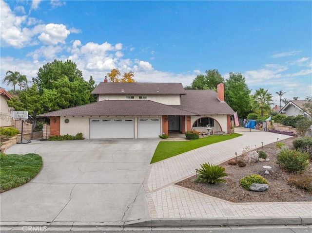 view of front of property with a garage