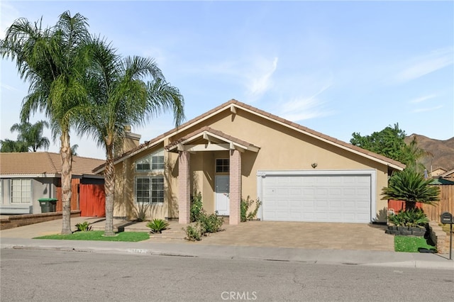 view of front of property featuring a garage