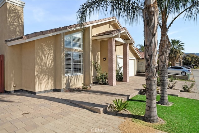 exterior space featuring a garage