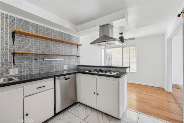 kitchen with island exhaust hood, white cabinetry, open shelves, and stainless steel dishwasher