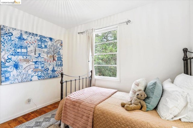 bedroom featuring hardwood / wood-style flooring